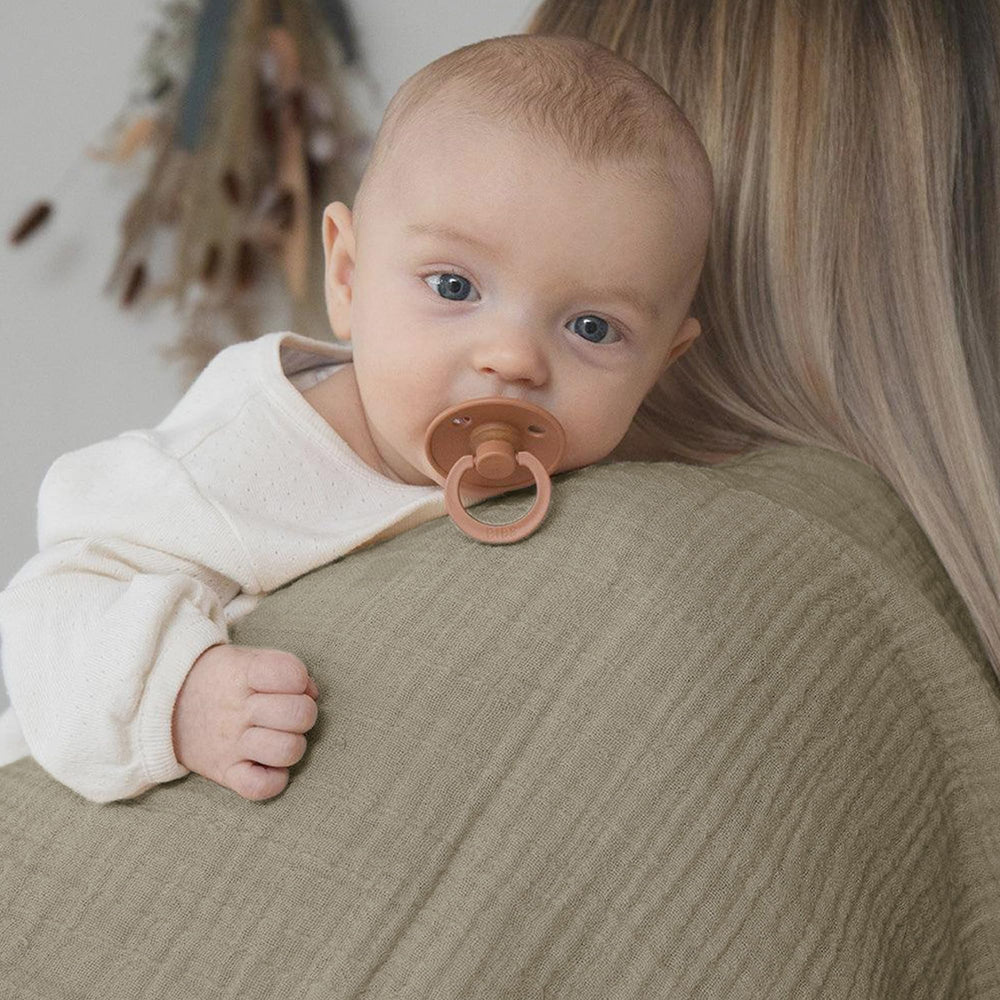 JELLYMONI Muslin Swaddle Blanket unisex-design image captures gender-neutral style for all newborns.