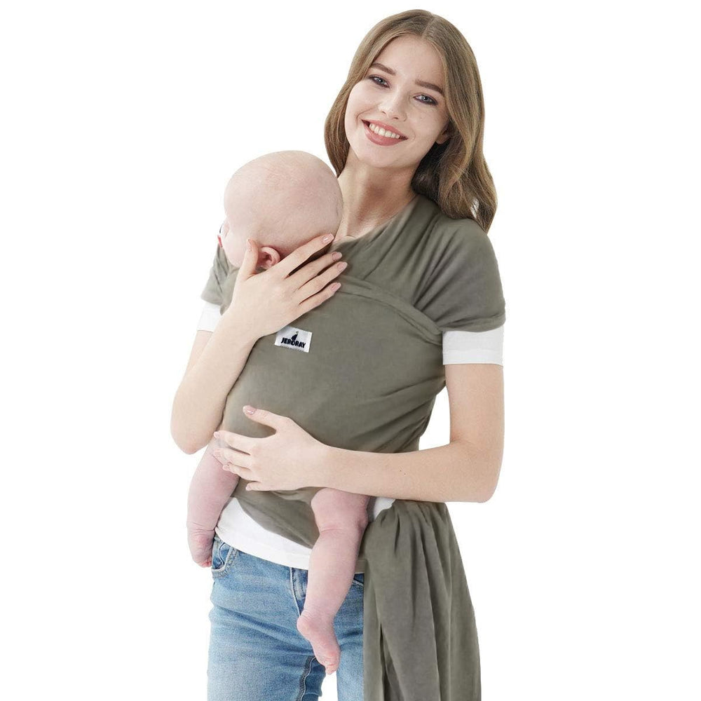 Jeroray baby wraps on model in sage green demonstrate hands-free comfort during everyday errands.