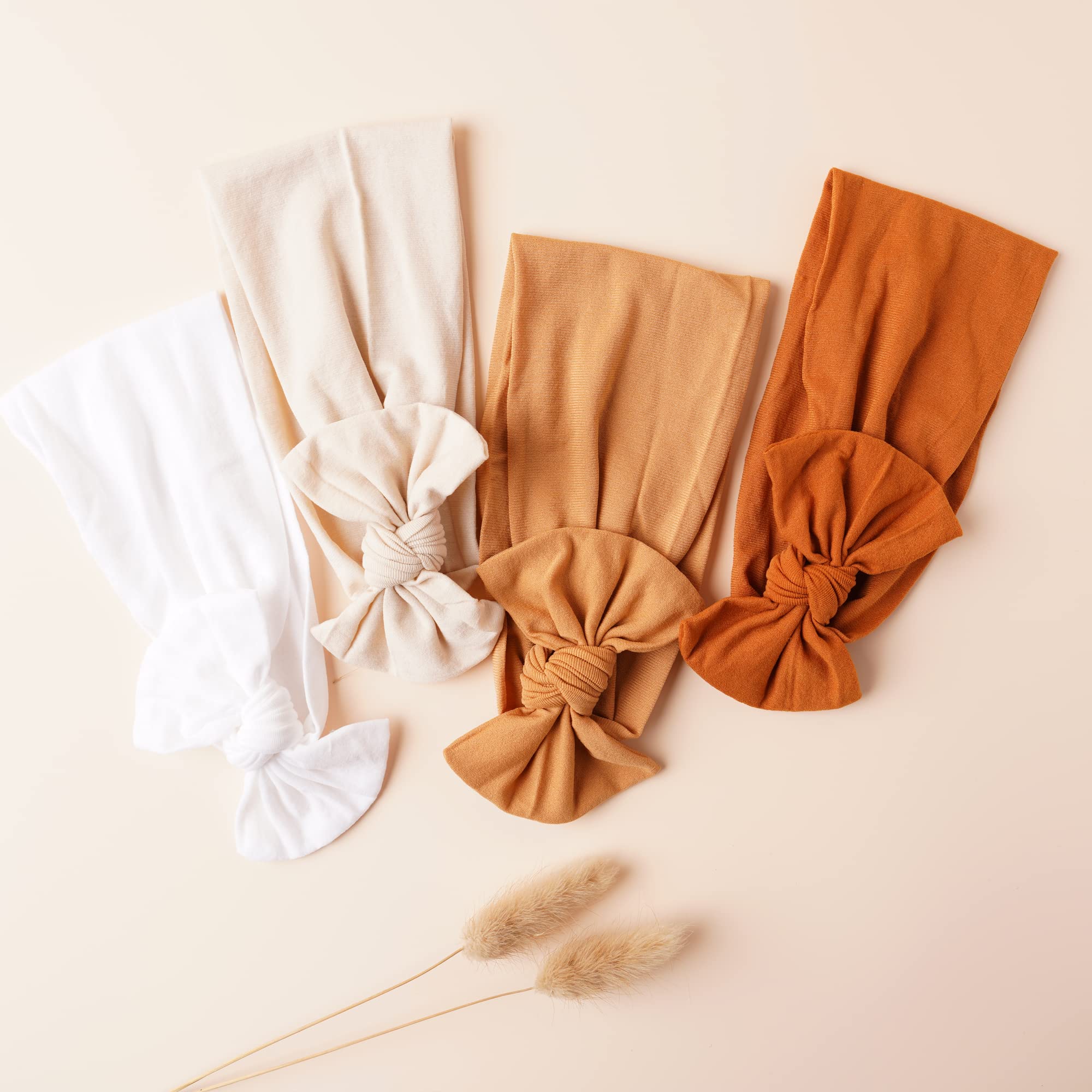 Jesries photo-ready headbands on baby outfits showcase