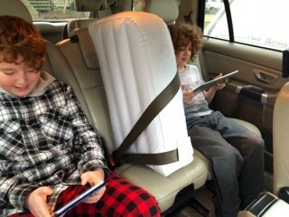 Jet Creations backseat divider keeps kids separated for a peaceful journey.