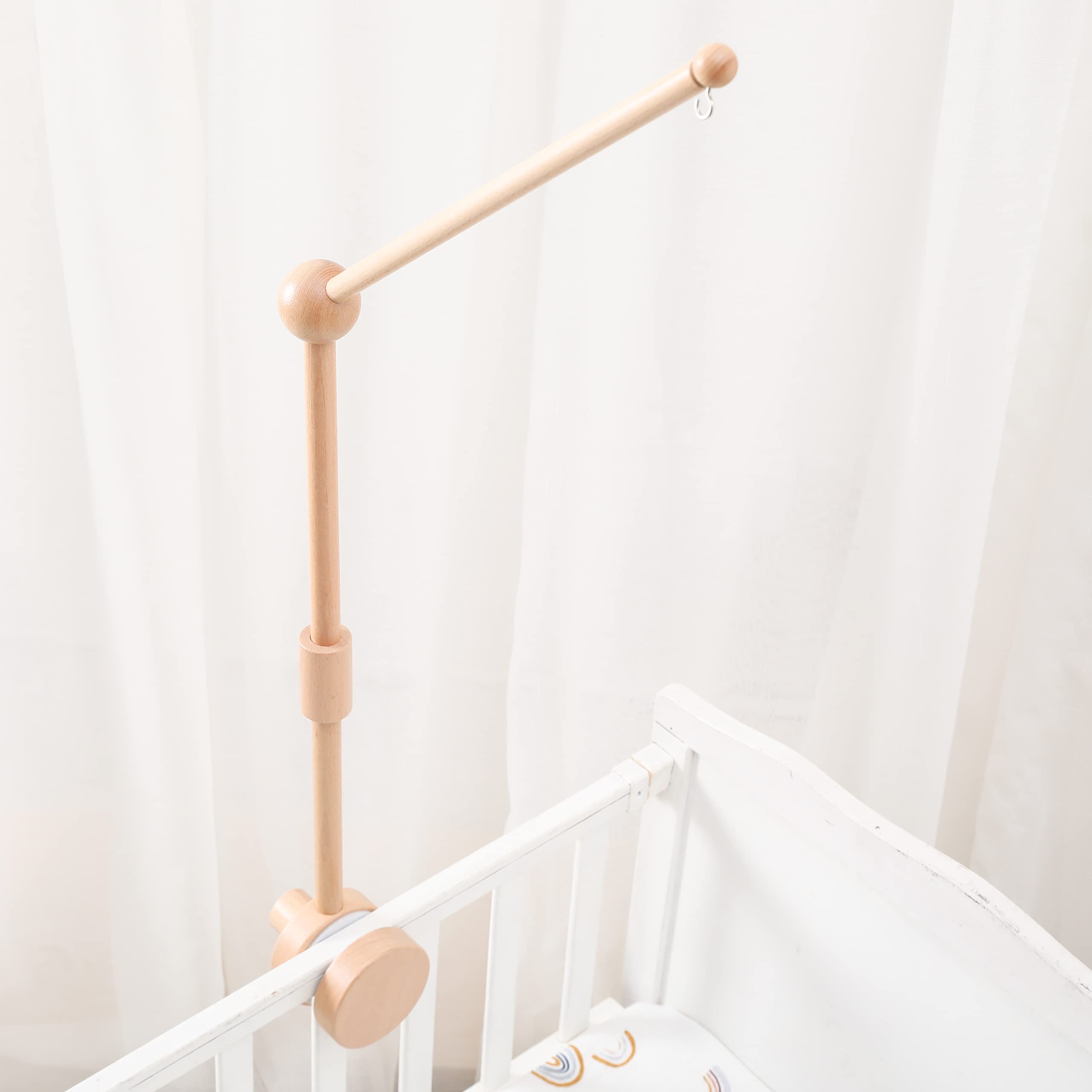 JETM·HH crib mobile-arm setup for safe nursery installation.