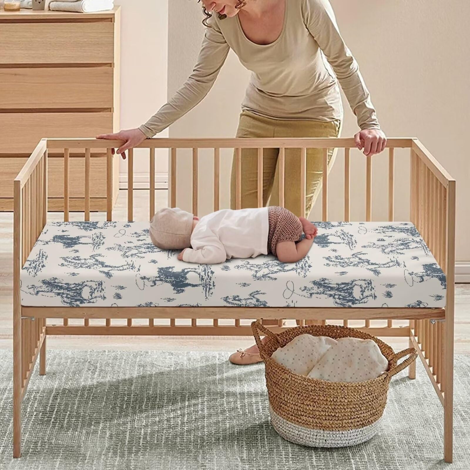 JIANADAER Fully elasticized crib sheet stays in place on standard mattresses