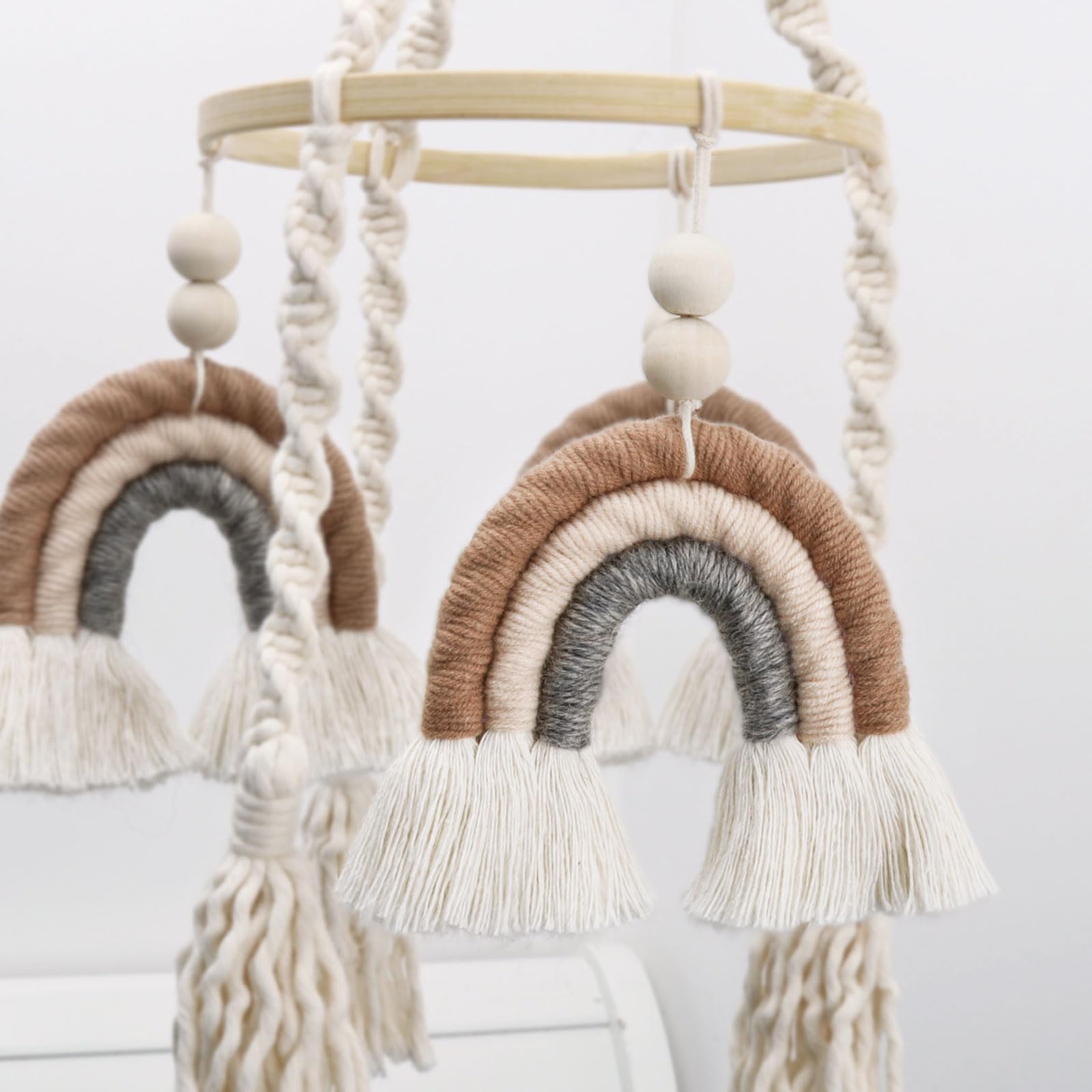 JILPAK natural-materials mobile uses eco-friendly rope and wood for a gentle, child-friendly look.