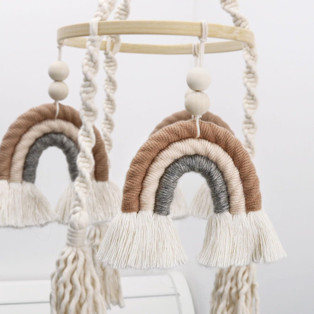 JILPAK natural-materials mobile uses eco-friendly rope and wood for a gentle, child-friendly look.