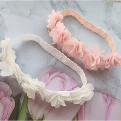 Jilukibo headband worn during a baby photoshoot for a sweet look.