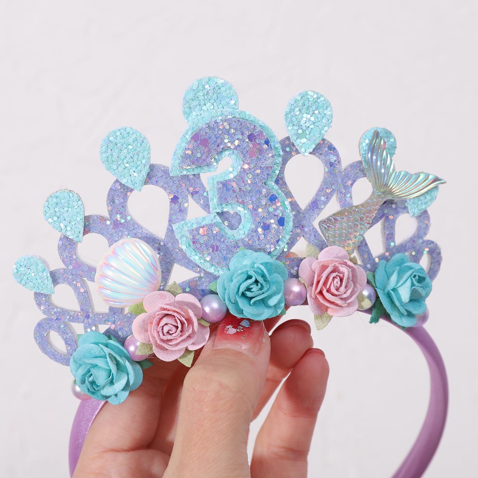 Jissoo Purple Flower Hairband closeup captures vivid colors and soft materials