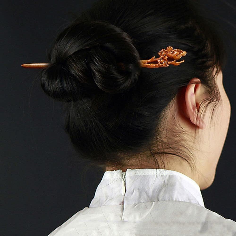 Jizlan retro carved hair-stick complements vintage outfits and retro-inspired looks.
