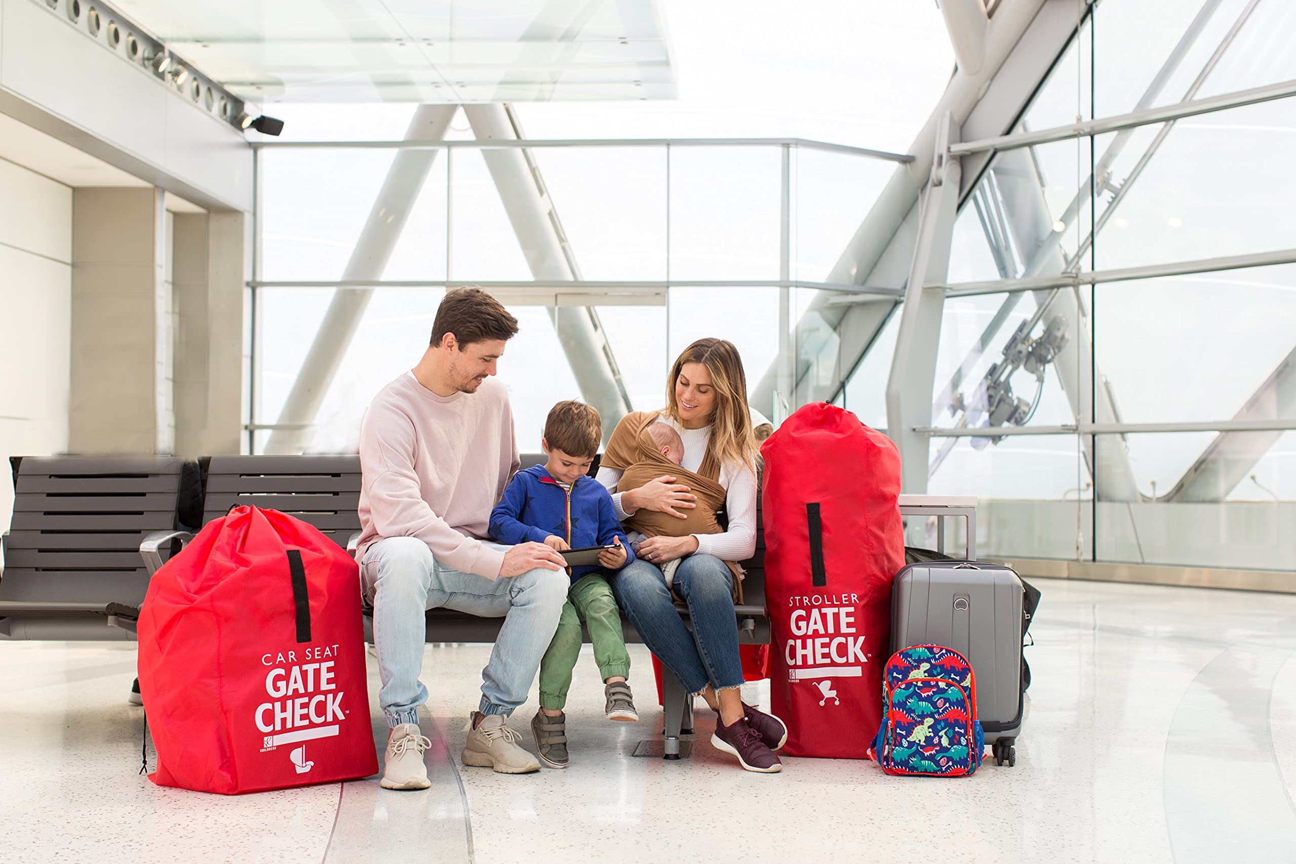 J.L. Childress gate check bag sturdy carry handle for easy lifting.