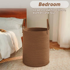 JMvicyroam basket placed in nursery for toys and blankets organization.