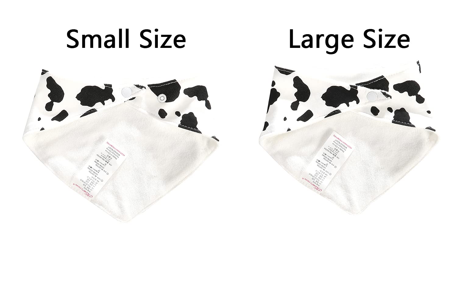 JN&LULU cow-pattern bibs worn by baby during play.