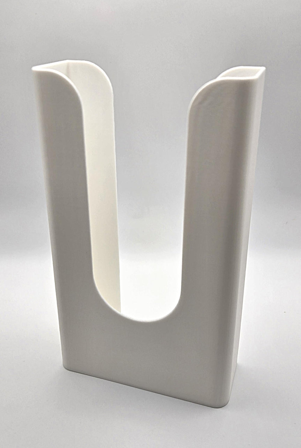 JNut3D dispenser loading pack into port highlights secure load and quick use.