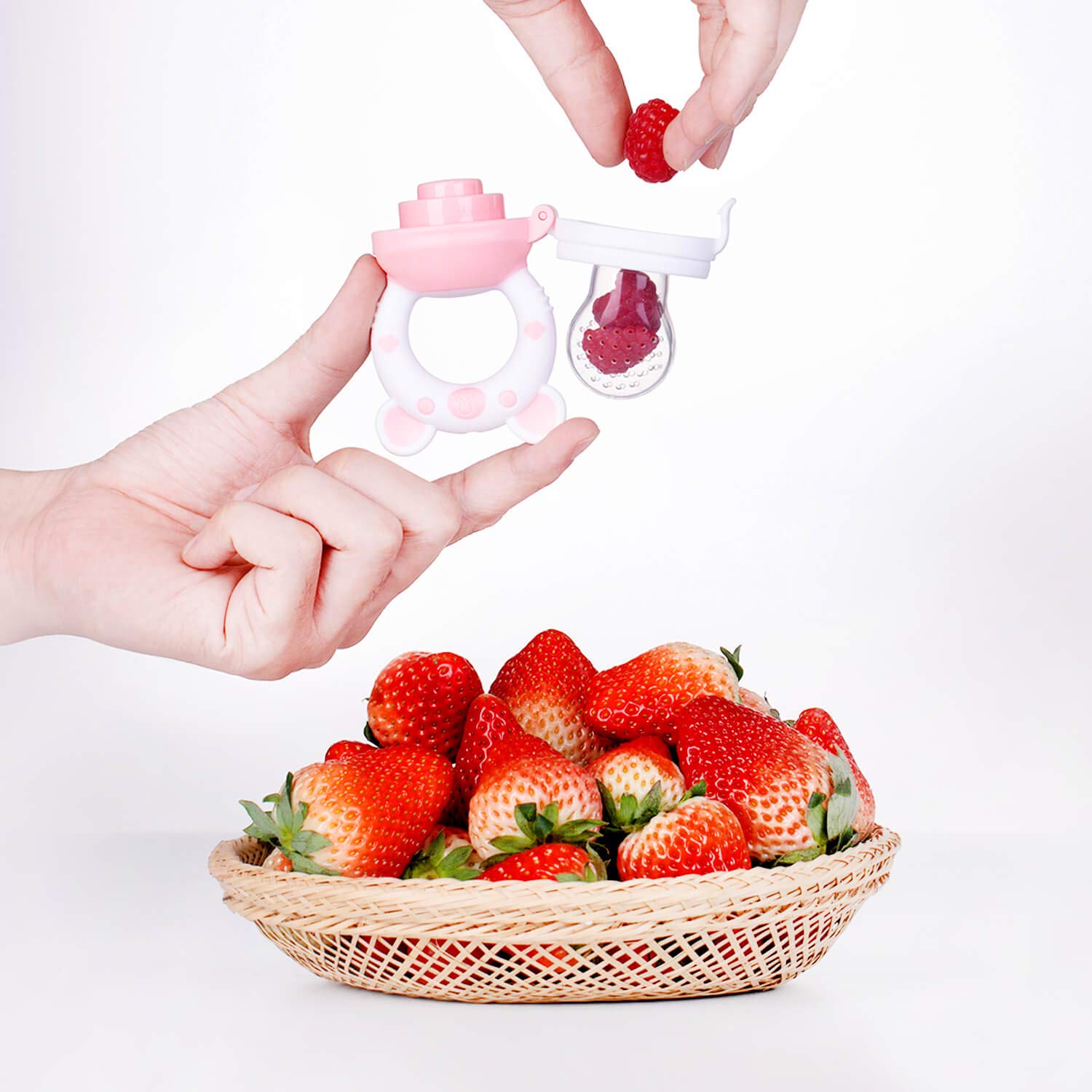 Jochebed bear-shaped feeder teether for gentle gum relief and safe solid introductions.