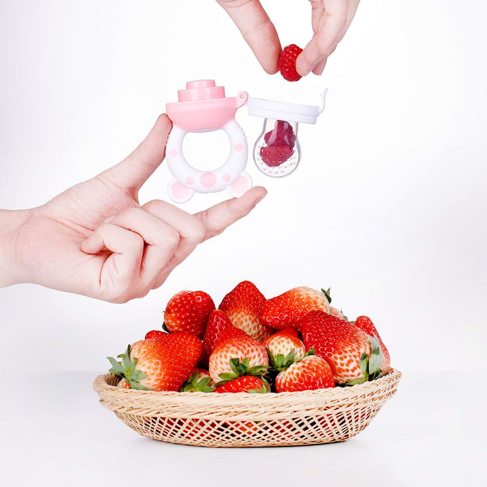 Jochebed bear-shaped feeder teether for gentle gum relief and safe solid introductions.