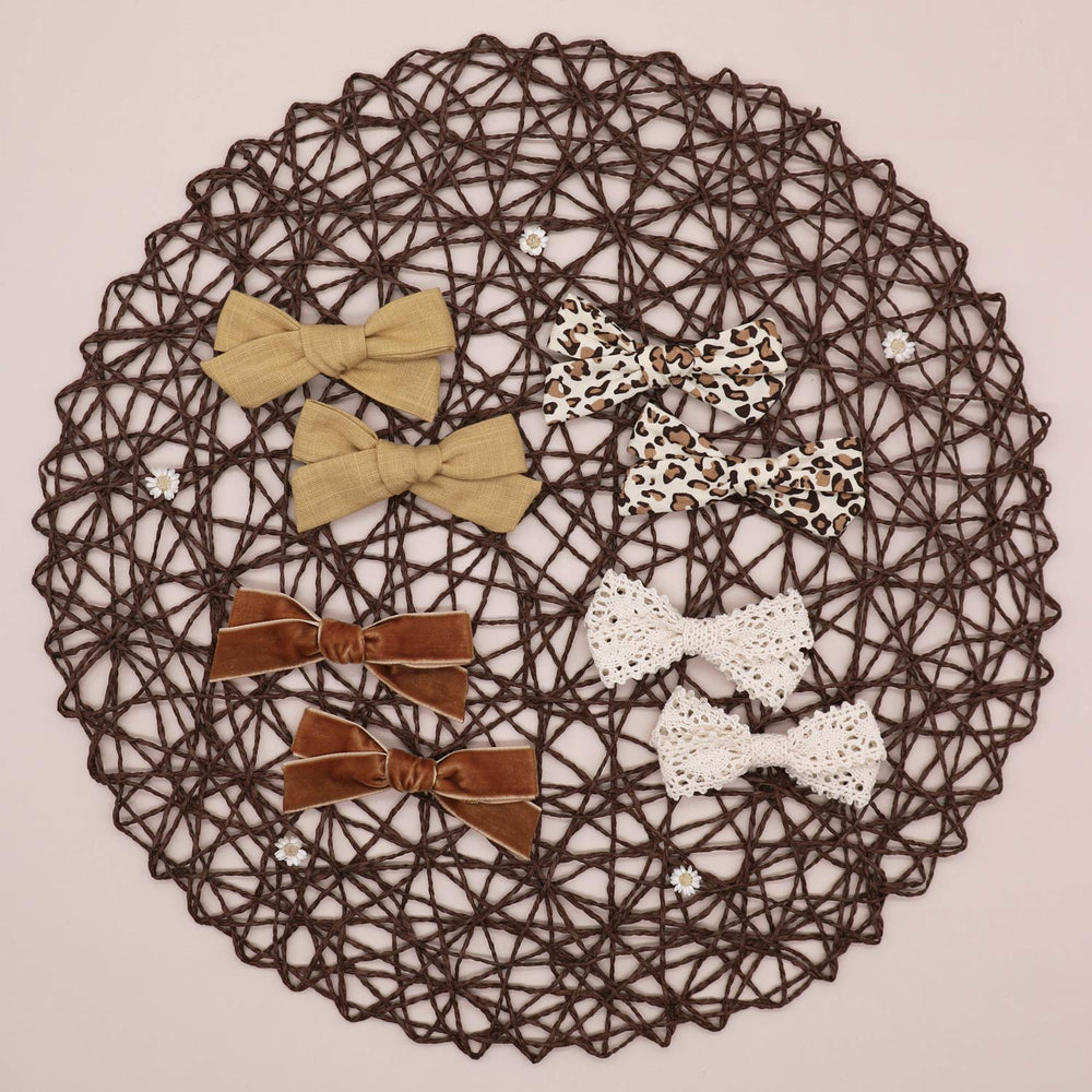 JoCoDesigns brown velvet bow clip brings luxe texture and secure hold