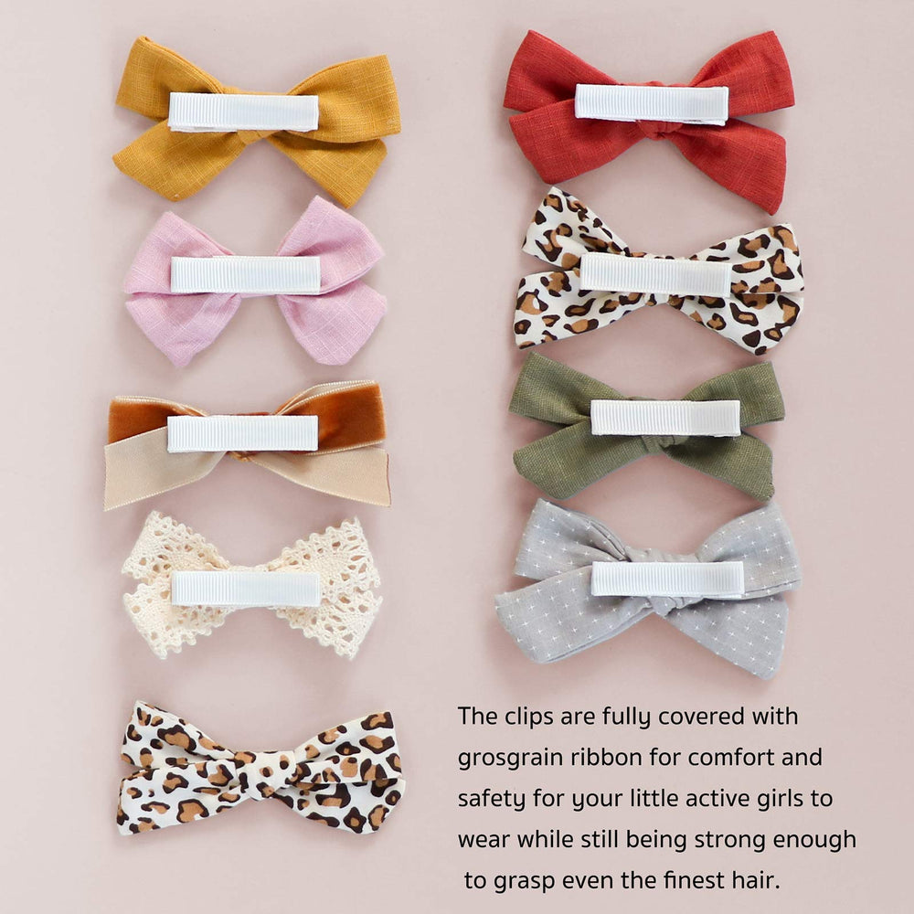 JoCoDesigns gray linen bow clip blends with cool-tone looks and stays in place