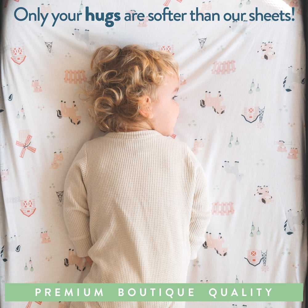 Joey + Joan farm-animals-design on-bassinet-sheets evokes cozy nursery vibe
