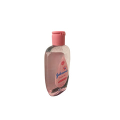 Johnson's Baby Cologne Powder Mist applied to skin shows subtle fragrance for routine use