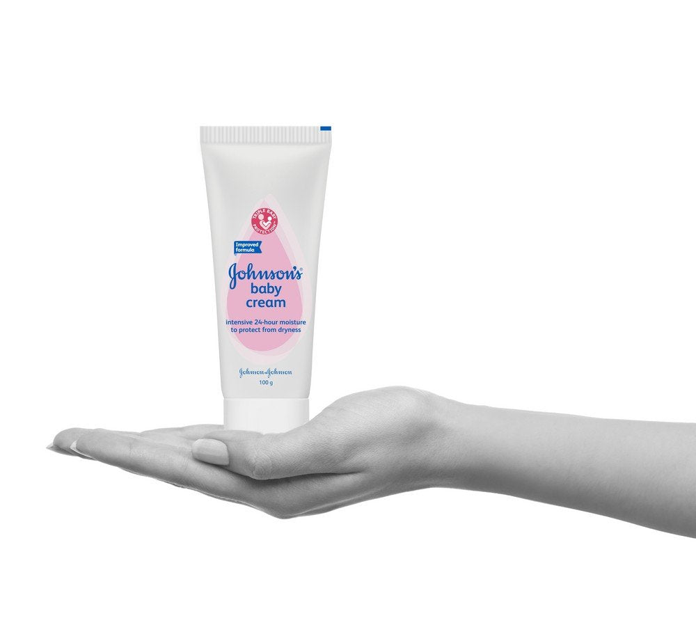 Johnson's Baby Cream on a nursery scene, everyday care routine.