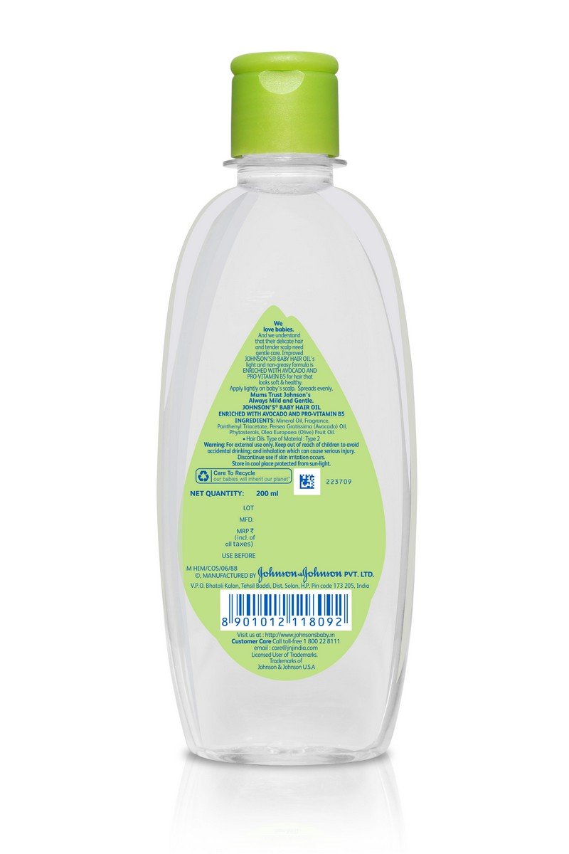 Johnson's Baby Hair Oil palm-application shows easy, soothing use for soft hair.