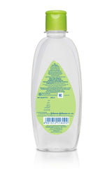 Johnson's Baby Hair Oil palm-application shows easy, soothing use for soft hair.