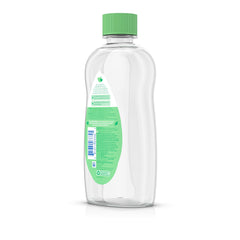Parent gives baby massage using Johnson's Baby Oil for bonding.