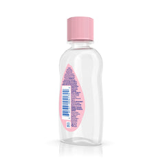 Johnson's Baby Oil pour action demonstrates easy spreading for quick moisture lock.