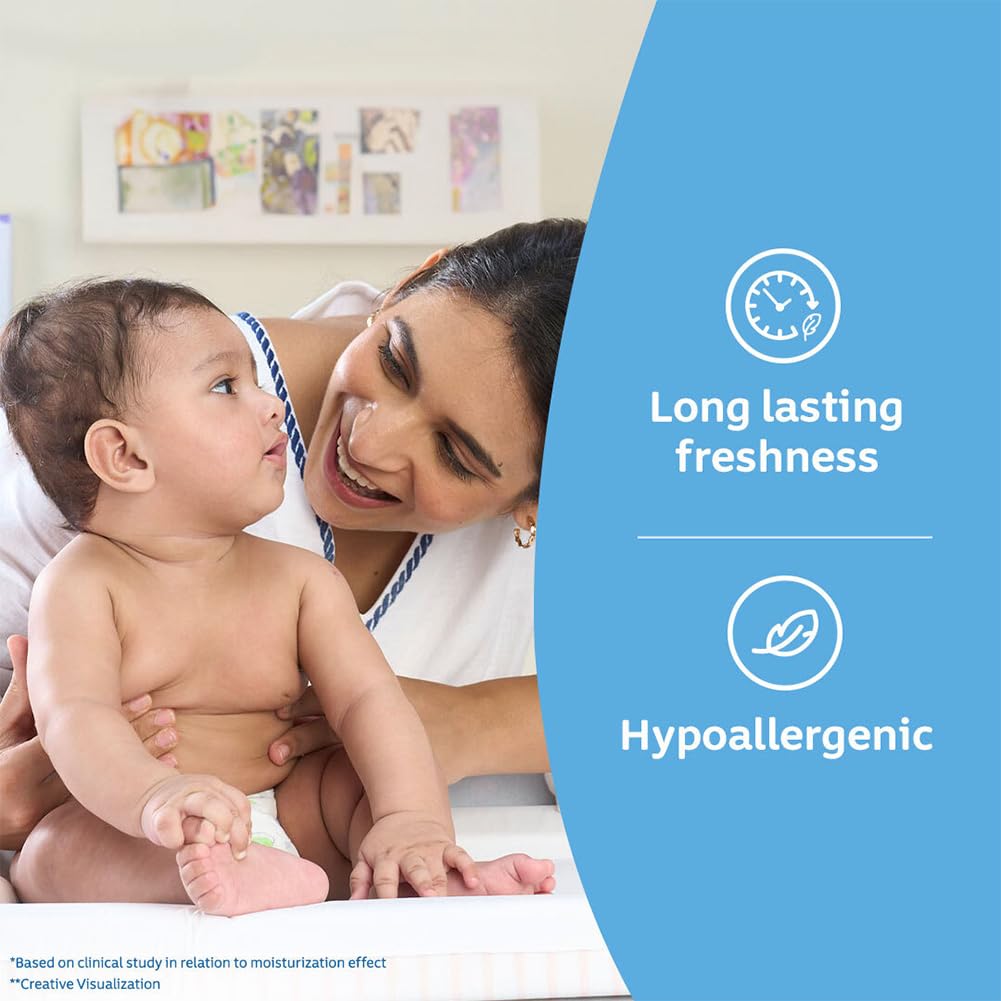 Johnson's Baby Powder 400g beside newborn clothes hints at after-bath dryness.
