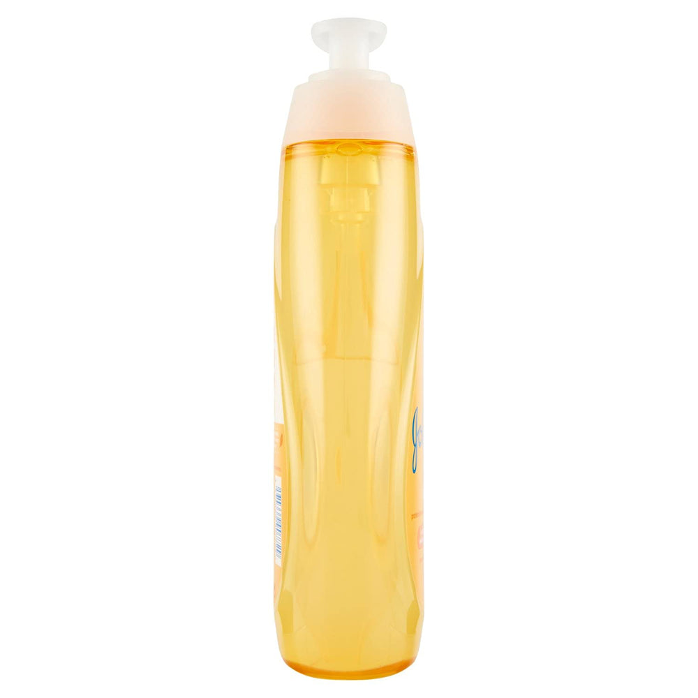 Johnson's Baby Shampoo being poured for easy rinse.