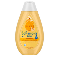 Johnson's Baby Shampoo bottle pour demonstrates gentle cleansing for delicate baby hair.