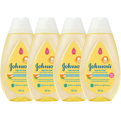 Johnson's Top-to-Toe baby wash travel bottles lined up for on-the-go cleansing.