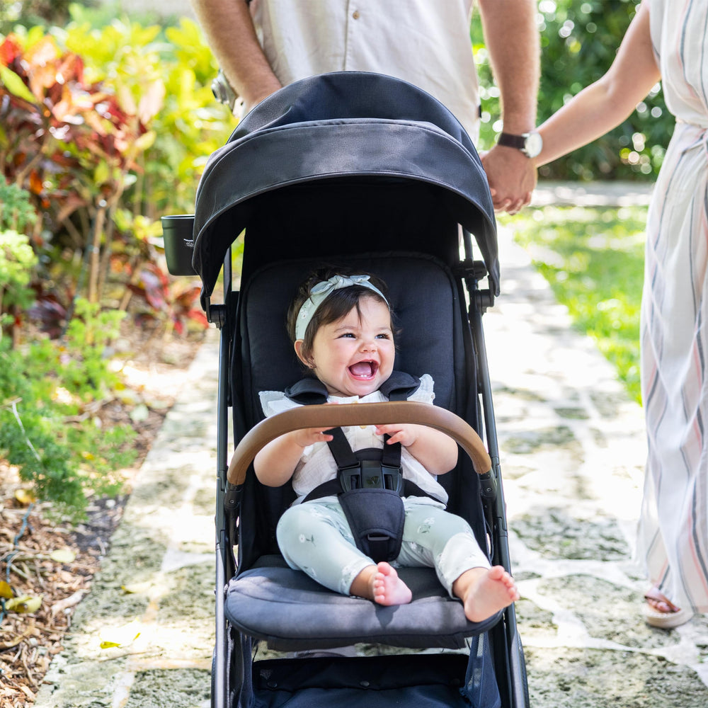 Joie Nutmeg car-seat-click attachment demonstrates quick car-seat conversion.