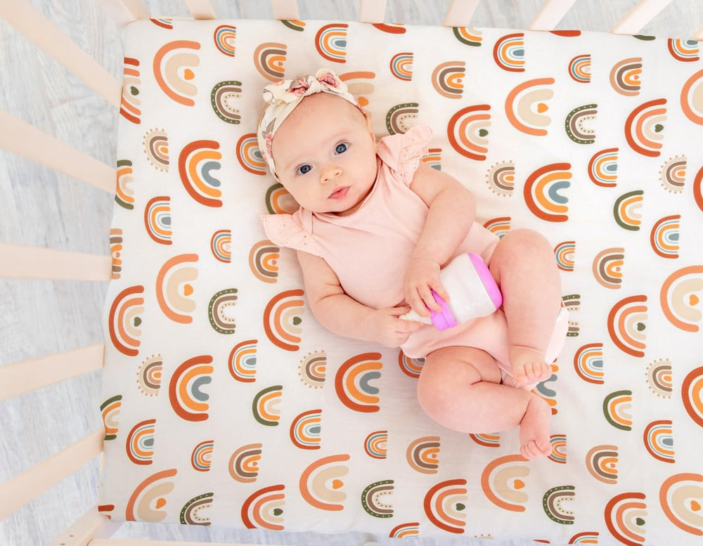 Jola's House 4-pack crib sheets rainbow: neutral unisex prints complement any nursery theme.