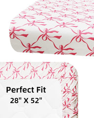 Jola's House bow crib sheets with elastic trim stay snugly in place.