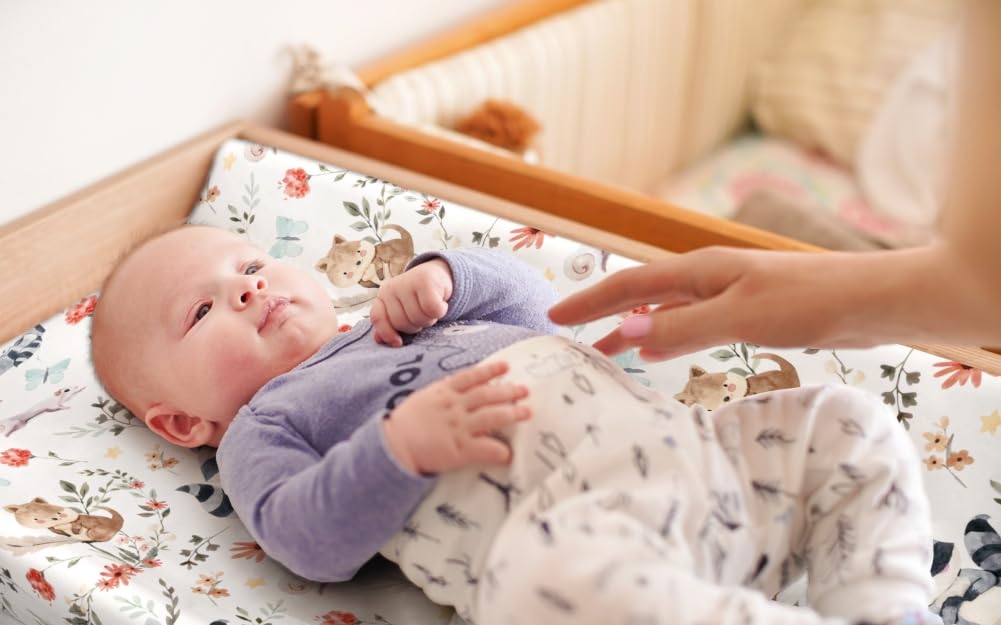 Jola's House four-pack changing pad cover set showing woodland patterns for unisex nursery