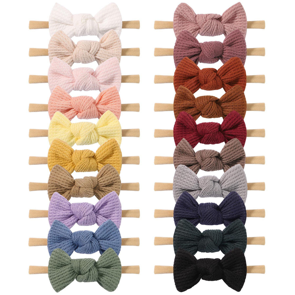 Jollybows 3.2-inch waffle bow on a stretchy nylon headband for newborn comfort