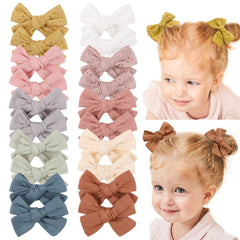 Jollybows 20pcs baby girl hair bows fabric closeup showing soft, comfortable material.