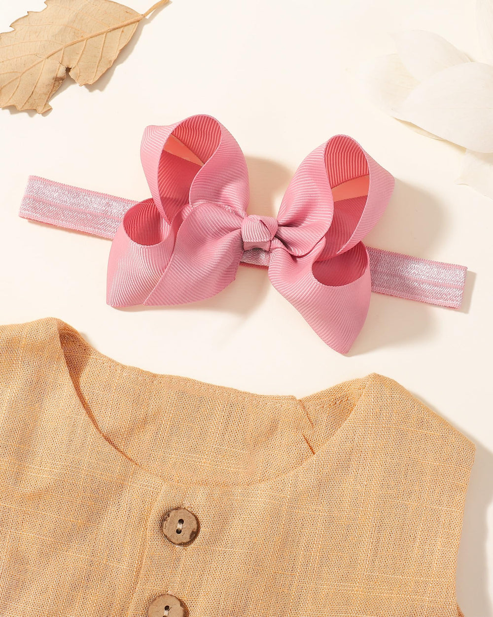 Jollybows girl wearing headband during playtime with cheerful style.