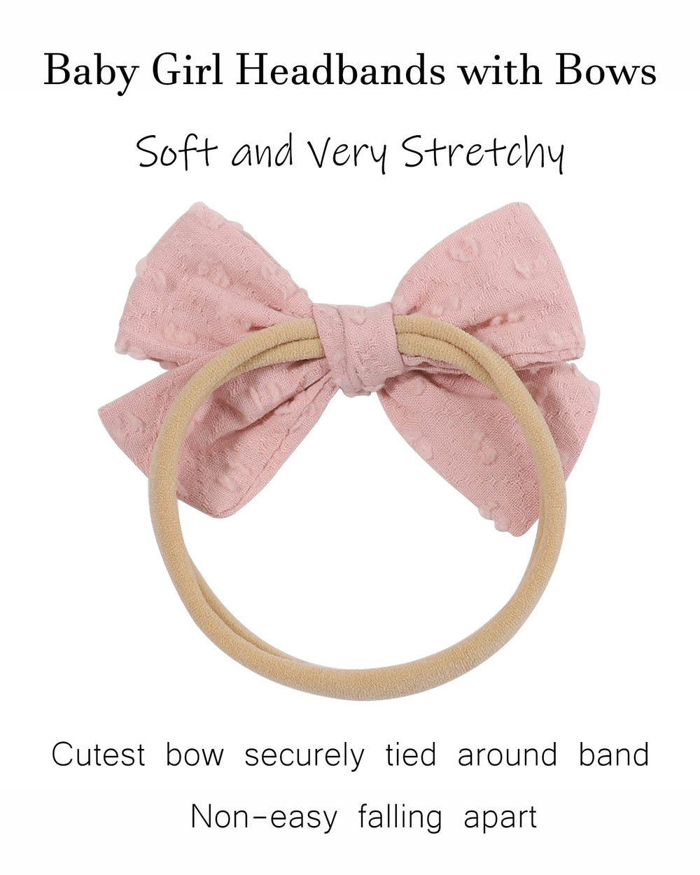 Jollybows baby bow on a smiling baby during a photo shoot.