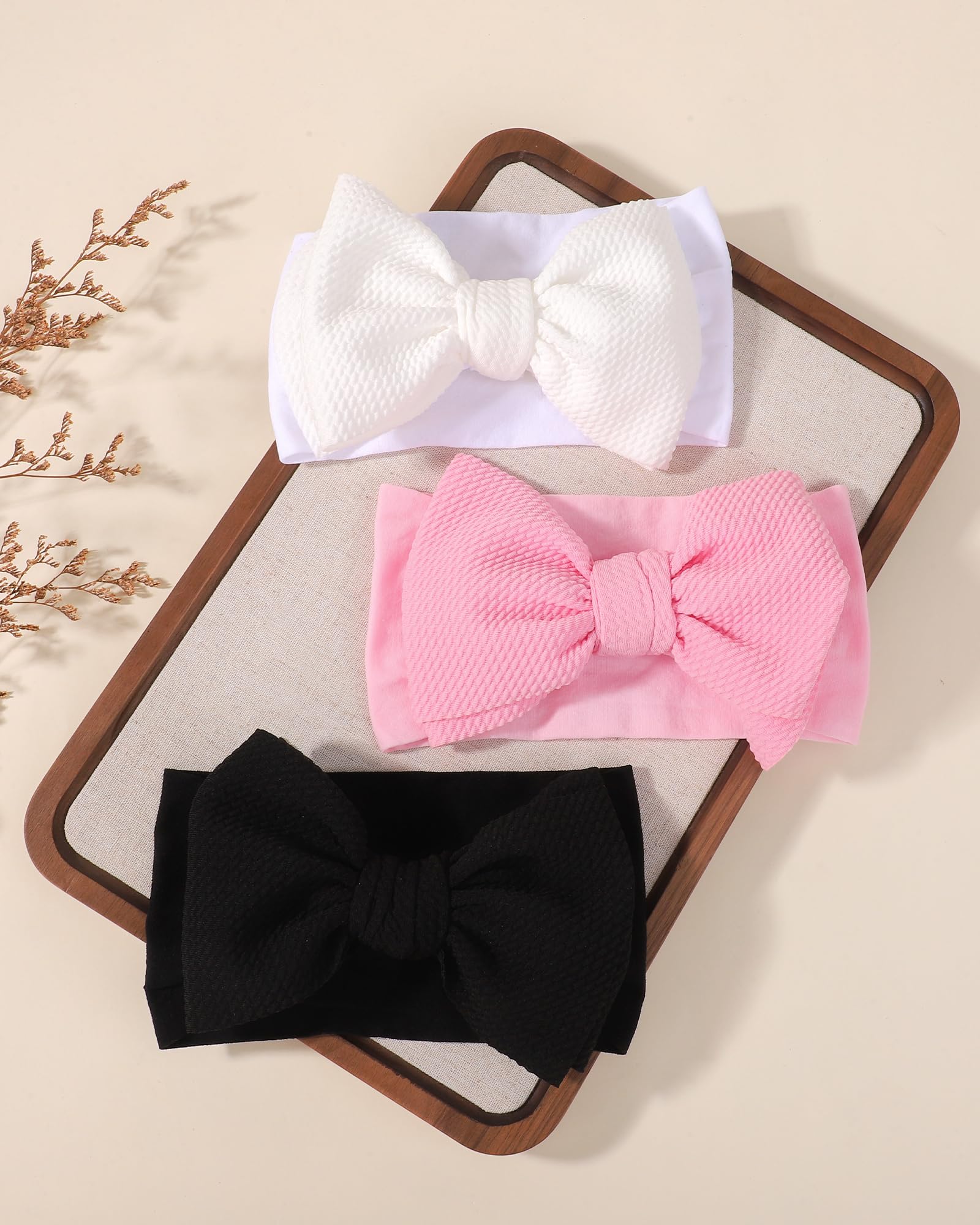 jollybows baby-wear-on-head headband shown on infant in soft stretch