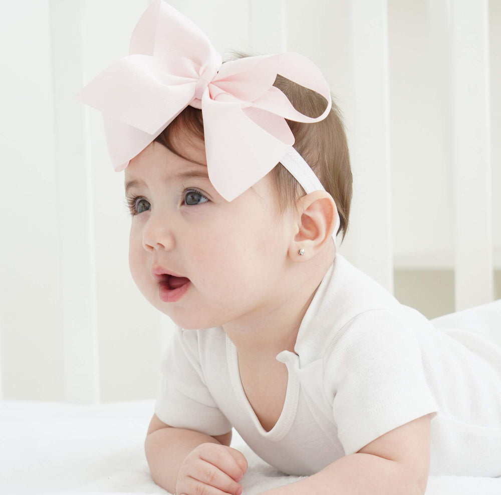 Jollybows baby bows on infants make styling quick and cute