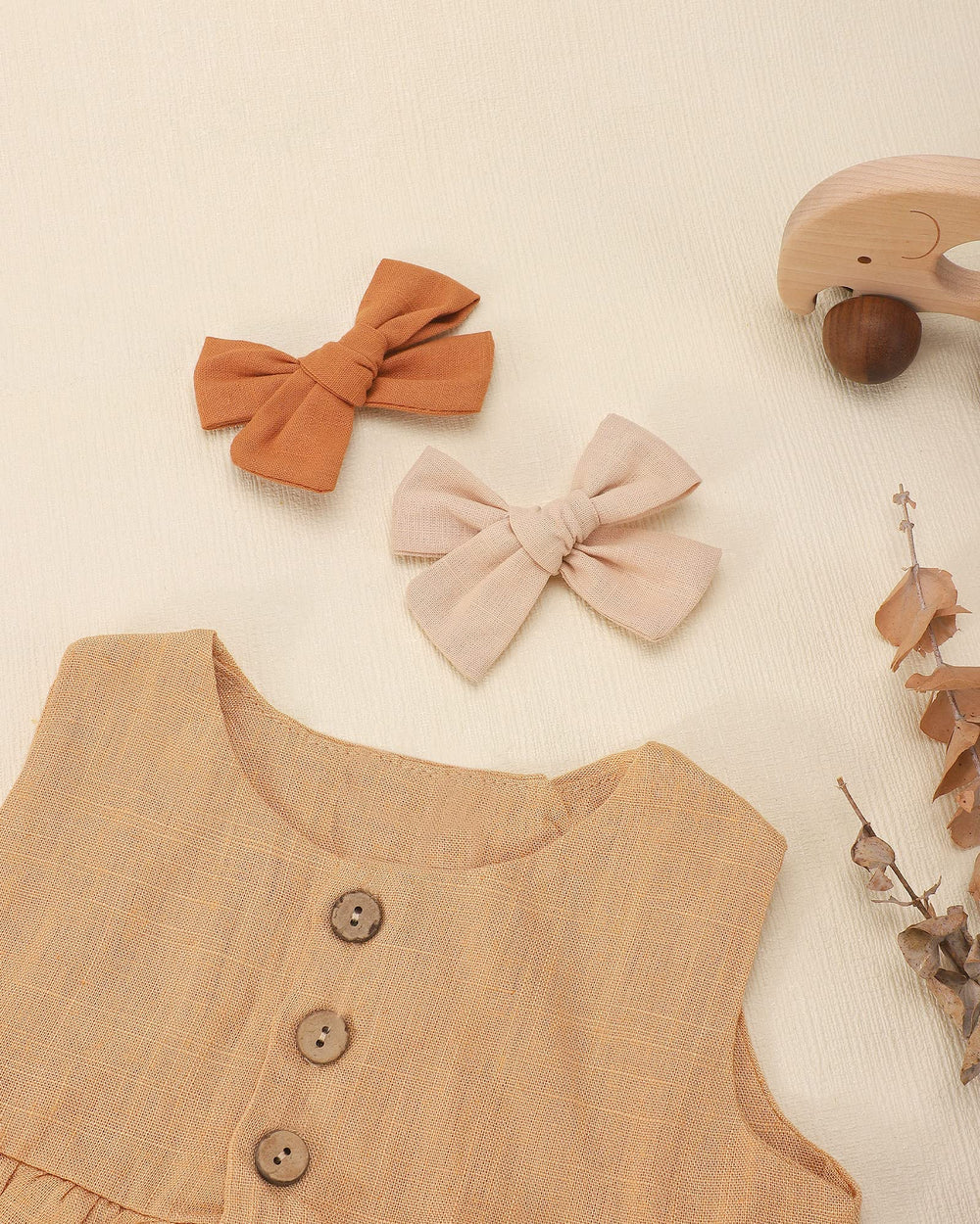 Jollybows baby hair clip close up demonstrates secure full lined clip for lasting hold.