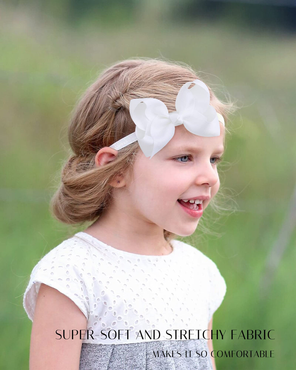 Jollybows baby hairband elastic-band-wear demonstrates comfortable stretch for growing heads.