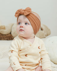 Jollybows baby headband newborn-to-toddler fit supports growing hair gracefully.