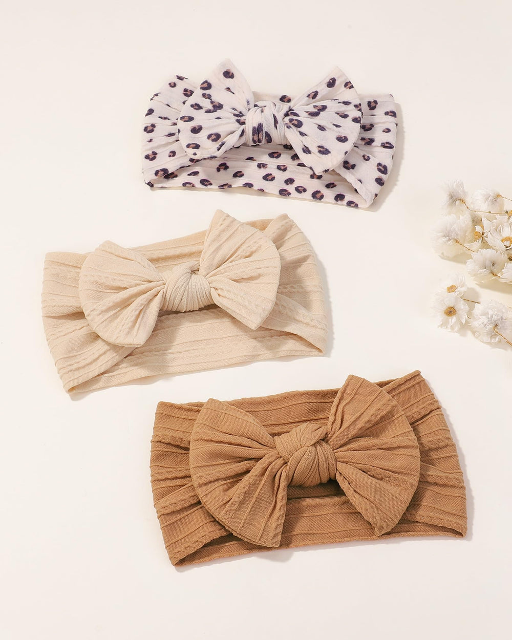 Jollybows baby headband wear-outfit shown with coordinating outfits.