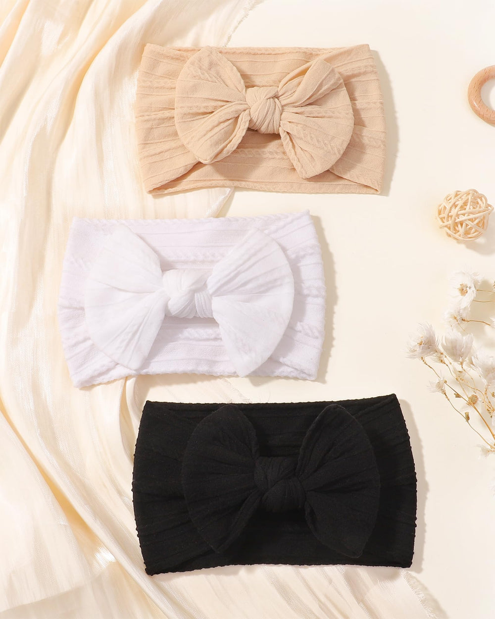 Jollybows baby headband wind-day wear suggests warmth for little ears.