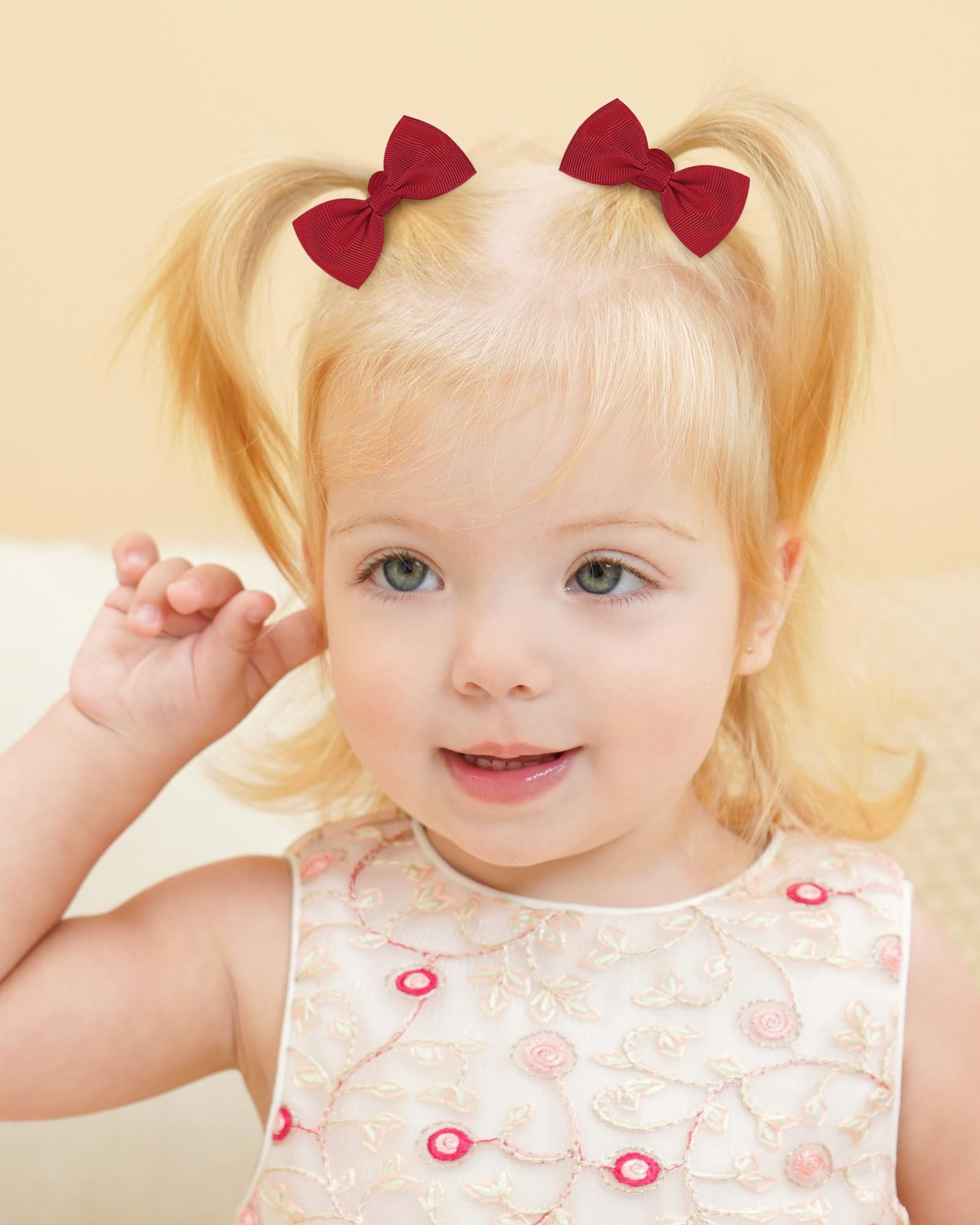 Jollybows baby hair ties with bow design add a cute, outfit-friendly touch.