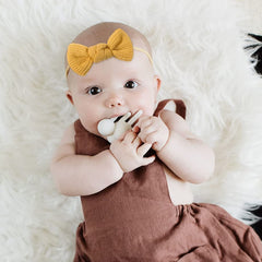 Jollybows bow on nylon band close-up showing secure attachment