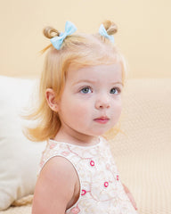 Jollybows elastic hair ties with bows ensure snug, gentle holds.