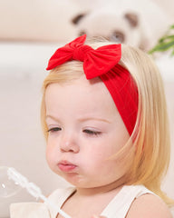 jollybows elastic headband expands with growing baby for long lasting wear.
