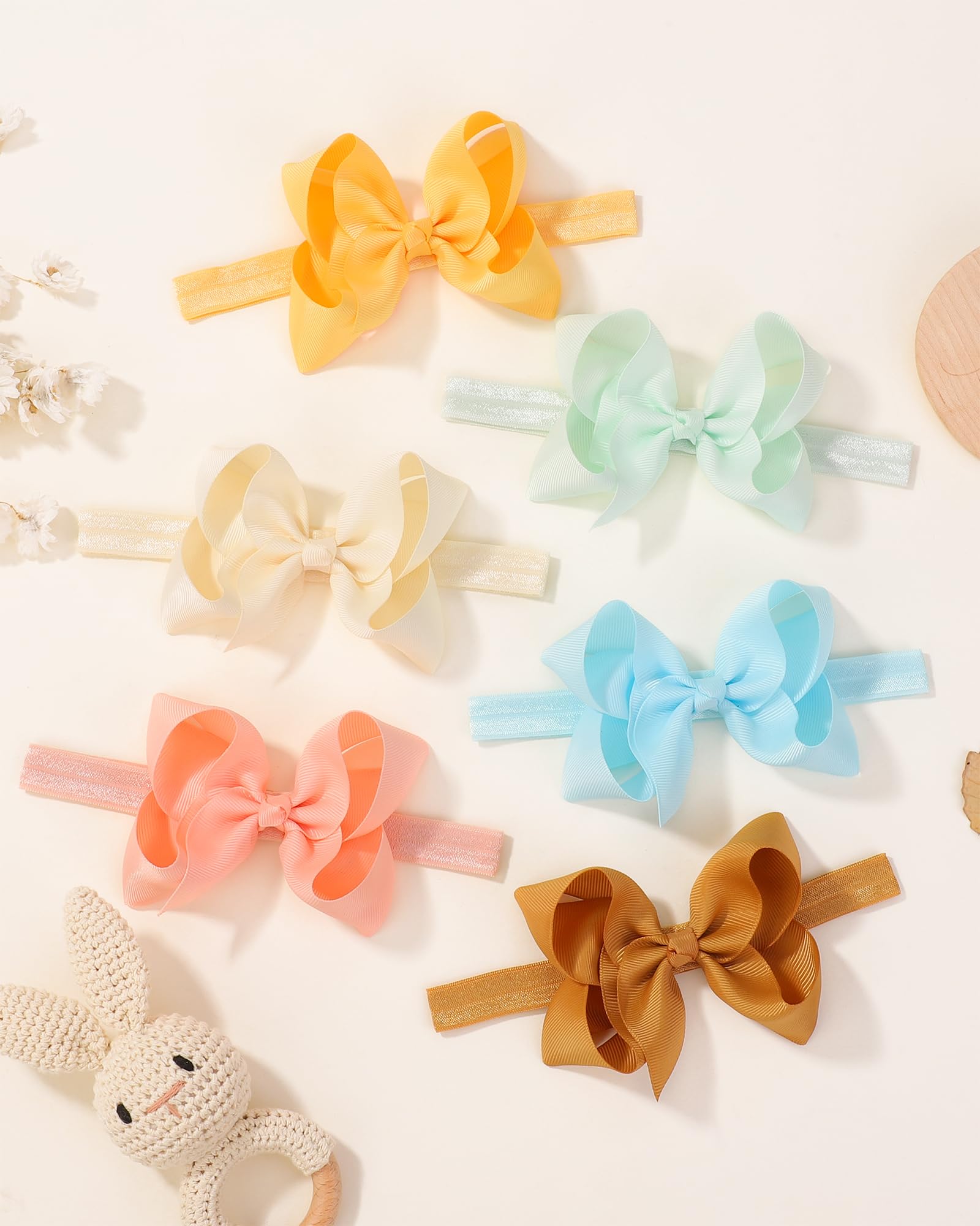 Jollybows expandable headbands demonstrating adjustable girth for easy dressing.